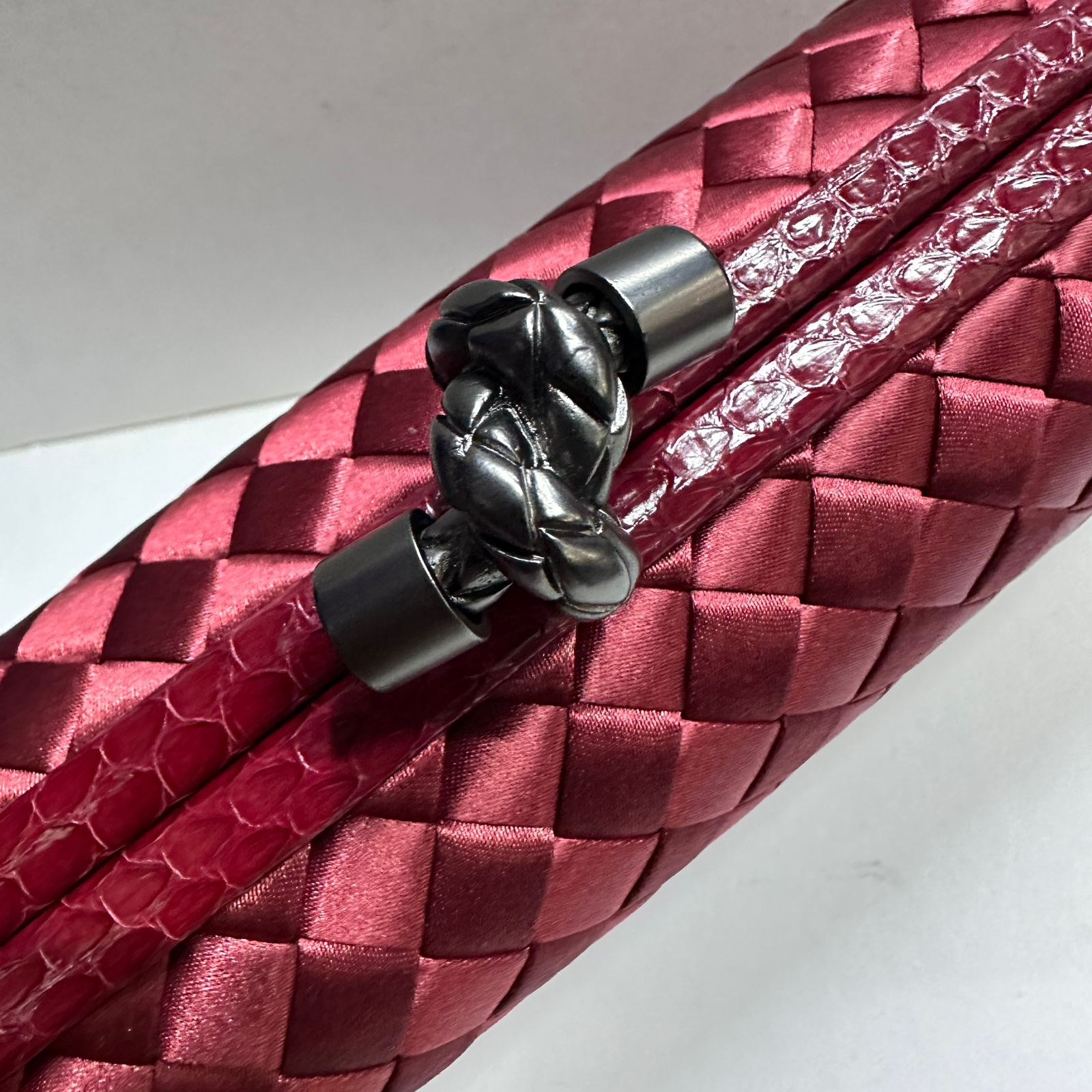 Elegant Red Woven Clutch with Metallic Knot Clasp