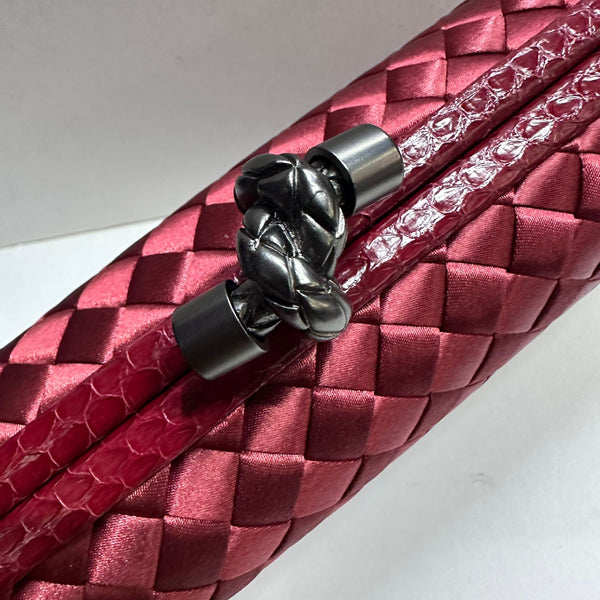 Elegant Red Woven Clutch with Metallic Knot Clasp