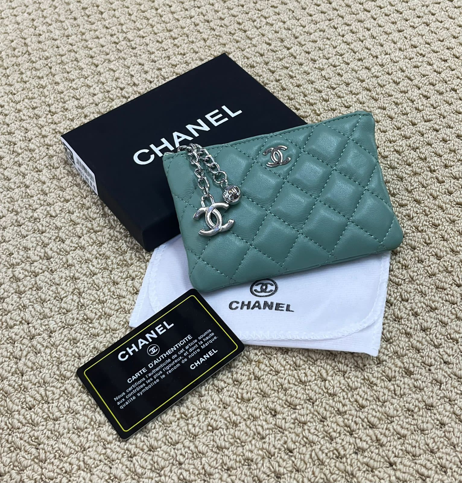 Chanel Quilted Leather Wallets in Black, Green, and Navy with Charm Detail