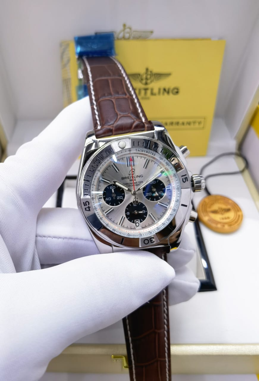 Breitling Chronograph with Gold Dial and Orange Rubber Strap